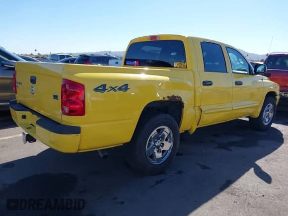 2006 Dodge Dakota SLT z VIN 1D7HW48J46S584508, wystawiony jako IAAI lot #40732421 z przebiegiem 148 957 mil mil oraz . Historia ofert i sprzedaży dostępna na DreamBid. Obrazek 4.