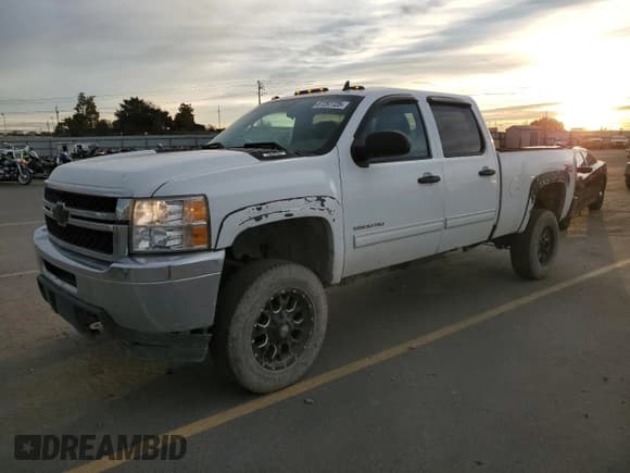 ✅ 2012 Chevrolet Silverado 2500HD LT • VIN: 1GC1KXCG1CF220488 • Lot: 87257725. Listed on Copart with 156,915 mi. Free auction sales archive from the USA and detailed vehicle history report at DreamBid. Image 1.
