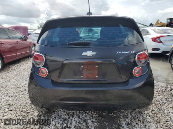 2015 Chevrolet Sonic LT с VIN 1G1JC6SH2F4108647, выставлен на аукционе Copart как лот 70682864 с пробегом 106 837 миль миль и Списание • Salvage title. История ставок и продаж доступна на DreamBid. Изображение 6.