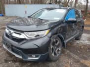 ✅ 2019 Honda CR-V Touring • VIN: 2HKRW2H99KH602129 • Lot: 43855817. Listed on IAAI with 91,135 mi. Free auction sales archive from the USA and detailed vehicle history report at DreamBid. Image 2.