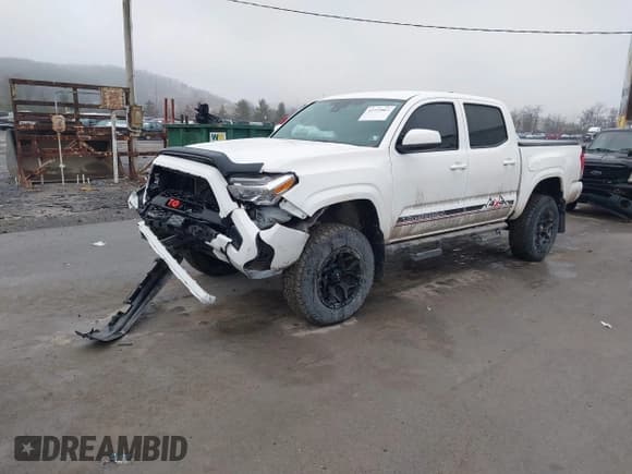 ✅ 2023 Toyota Tacoma SR • VIN: 3TYCZ5AN3PT163151 • Lot: 43737867. Listed on IAAI with 22,403 mi. Free auction sales archive from the USA and detailed vehicle history report at DreamBid. Image 2.