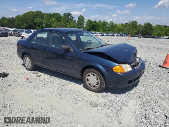 ✅ 1999 Mazda Protege DX • VIN: JM1BJ2229X0137724 • Lot: 55149115. Wystawiony na Copart z przebiegiem 173 108 mil. Bezpłatny archiwum sprzedaży aukcyjnych z USA i szczegółowy raport historii pojazdu na DreamBid. Zdjęcie 4.
