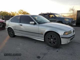 ✅ 1998 BMW 3 Series 318ti • VIN: WBACG8329WKC84200 • Lot: 76909614. Listed on Copart with 260,422 mi. Free auction sales archive from the USA and detailed vehicle history report at DreamBid. Image 4.