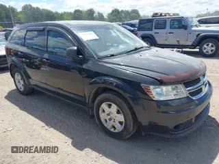 2012 Dodge Journey American Value with VIN 3C4PDCAB5CT203882, listed as a IAAI auction lot 42793968 with 171,518 mi miles and . Bid and sale history available at DreamBid. Image 1.