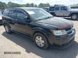 ✅ 2012 Dodge Journey American Value • VIN: 3C4PDCAB5CT203882 • Lot: 42793968. Listed on IAAI with 171,518 mi. Free auction sales archive from the USA and detailed vehicle history report at DreamBid. Image 1.