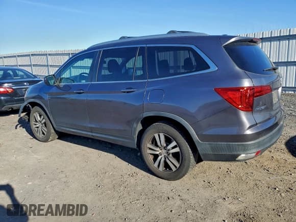 ✅ 2018 Honda Pilot EX-L • VIN: 5FNYF6H56JB028361 • Lot: 93402365. Listed on Copart with 139,342 mi. Free auction sales archive from the USA and detailed vehicle history report at DreamBid. Image 2.