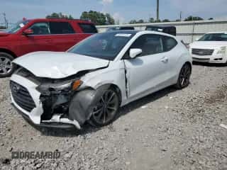 2019 Hyundai Veloster Premium z VIN KMHTG6AFXKU003039, wystawiony jako Copart lot #65254234 z przebiegiem 50 396 mil mil oraz Szkoda całkowita • Salvage title. Historia ofert i sprzedaży dostępna na DreamBid. Obrazek 1.