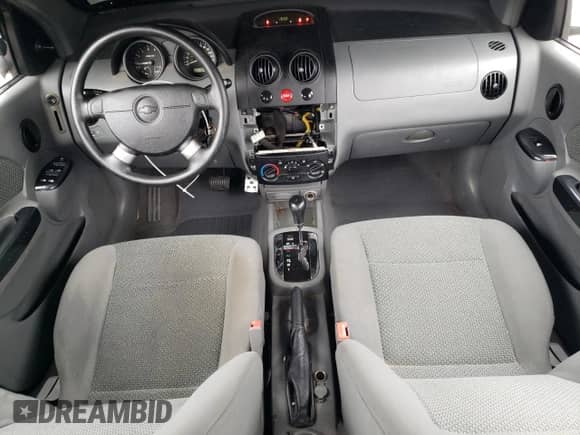 2005 Chevrolet Aveo LT z VIN KL1TG62615B413576, wystawiony jako Copart lot #67797175 z przebiegiem 90 290 mil mil oraz Szkoda całkowita • Salvage title. Historia ofert i sprzedaży dostępna na DreamBid. Obrazek 8.