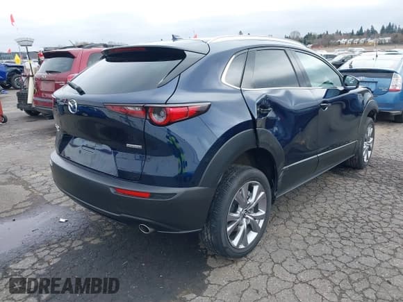 ✅ 2020 Mazda CX-30 Premium • VIN: 3MVDMBEM5LM127596 • Lot: 41752466. Wystawiony na IAAI z przebiegiem 28 946 mil. Bezpłatny archiwum sprzedaży aukcyjnych z USA i szczegółowy raport historii pojazdu na DreamBid. Zdjęcie 4.