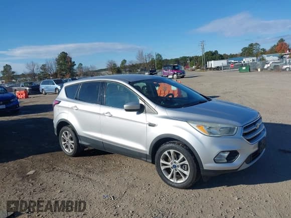 ✅ 2017 Ford Escape SE • VIN: 1FMCU9GD1HUD56858 • Lot: 43696316. Listed on IAAI with 130,024 mi. Free auction sales archive from the USA and detailed vehicle history report at DreamBid. Image 1.