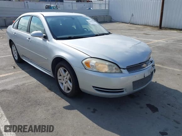 ✅ 2014 Chevrolet Impala LT • VIN: 2G1WB5E31E1100066 • Lot: 42240075. Listed on IAAI with 175,209 mi. Free auction sales archive from the USA and detailed vehicle history report at DreamBid. Image 1.