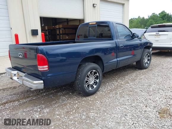 2000 Dodge Dakota z VIN 1B7FL26X1YS606389, wystawiony jako IAAI lot #42365620 z przebiegiem 142 889 mil mil oraz . Historia ofert i sprzedaży dostępna na DreamBid. Obrazek 4.