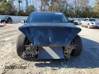 ✅ 2022 Tesla Model X • VIN: 7SAXCBE59NF334254 • Lot: 37829183. Listed on Copart with 6,913 mi. Free auction sales archive from the USA and detailed vehicle history report at DreamBid. Image 5.