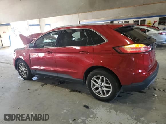 ✅ 2021 Ford Edge SEL • VIN: 2FMPK4J90MBA13022 • Lot: 90825505. Listed on Copart with 59,571 mi. Free auction sales archive from the USA and detailed vehicle history report at DreamBid. Image 2.