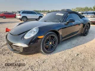 ✅ 2015 Porsche 911 Carrera • VIN: WP0CA2A9XFS137088 • Lot: 84152415. Listed on Copart with 34,522 mi. Free auction sales archive from the USA and detailed vehicle history report at DreamBid. Image 1.