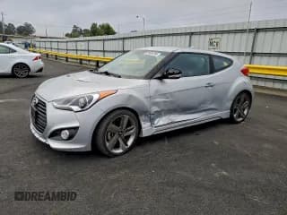 ✅ 2015 Hyundai Veloster Turbo • VIN: KMHTC6AE2FU234834 • Lot: 95484365. Listed on Copart with 30,445 mi. Free auction sales archive from the USA and detailed vehicle history report at DreamBid. Image 1.