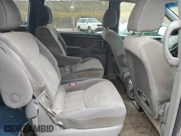 2009 Toyota Sienna LE z VIN 5TDZK23C79S272185, wystawiony jako Copart lot #90288145 z przebiegiem 272 534 mil mil oraz Czysty tytuł • Clean title. Historia ofert i sprzedaży dostępna na DreamBid. Obrazek 11.