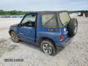 ✅ 1993 Geo Tracker • VIN: 2CNBJ18UXP6921660 • Лот: 58027275. Опубликован ранее на Copart с пробегом 64 349 миль. Бесплатный доступ к архиву аукционных продаж из США и подробный отчёт об истории автомобиля на DreamBid. Изображение 2.
