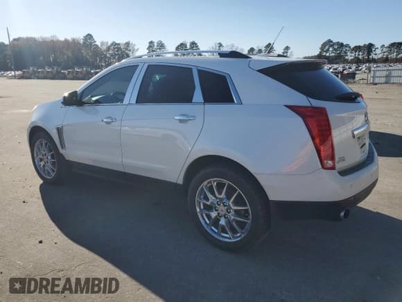 ✅ 2014 Cadillac SRX Performance Collection • VIN: 3GYFNCE39ES547858 • Lot: 91004315. Listed on Copart with 226,787 mi. Free auction sales archive from the USA and detailed vehicle history report at DreamBid. Image 2.