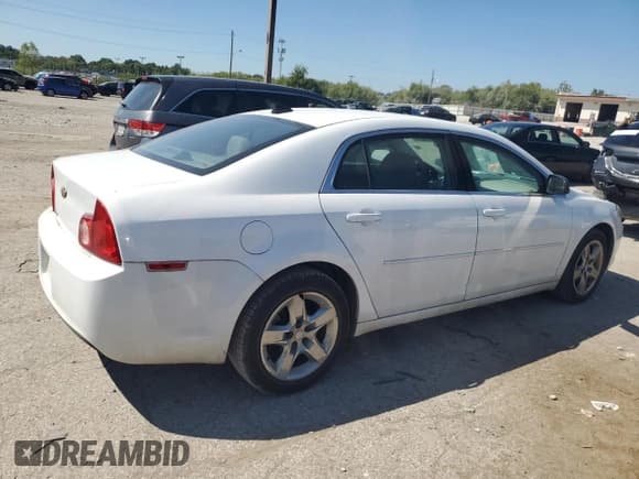 ✅ 2012 Chevrolet Malibu 1LS • VIN: 1G1ZB5E01CF183653 • Lot: 69946874. Listed on Copart with 127,732 mi. Free auction sales archive from the USA and detailed vehicle history report at DreamBid. Image 3.