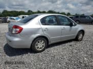 ✅ 2012 Suzuki SX4 LE • VIN: JS2YC5A34C6305573 • Лот: 61501735. Опубликован ранее на Copart с пробегом 123 367 миль. Бесплатный доступ к архиву аукционных продаж из США и подробный отчёт об истории автомобиля на DreamBid. Изображение 3.