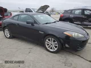 2008 Hyundai Tiburon GS z VIN KMHHM66D28U264874, wystawiony jako Copart lot #44803245 z przebiegiem 193 975 mil mil oraz Szkoda całkowita • Salvage title. Historia ofert i sprzedaży dostępna na DreamBid. Obrazek 4.