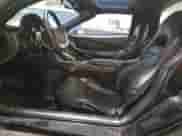 2004 Chevrolet Corvette z VIN 1G1YY22G645133638, wystawiony jako Copart lot #87247835 z przebiegiem 65 878 mil mil oraz Szkoda całkowita • Salvage title. Historia ofert i sprzedaży dostępna na DreamBid. Obrazek 7.