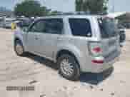 2009 Mercury Mariner Premier with VIN 4M2CU97779KJ00665, listed as a IAAI auction lot 42698060 with 162,205 mi miles and . Bid and sale history available at DreamBid. Image 3.