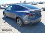 ✅ 2023 Tesla Model Y Long Range • VIN: 7SAYGDEE8PA122529 • Lot: 43101493. Listed on IAAI with 29,770 mi. Free auction sales archive from the USA and detailed vehicle history report at DreamBid. Image 3.