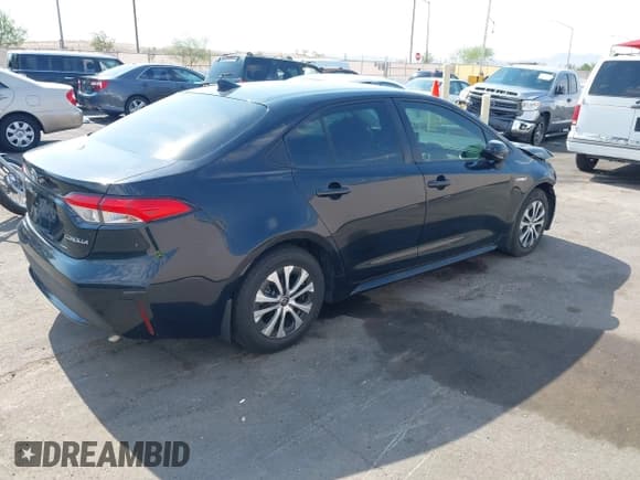 ✅ 2021 Toyota Corolla Hybrid LE • VIN: JTDEAMDE4MJ000597 • Лот: 42745017. Опубликован ранее на IAAI с пробегом 149 683 миль. Бесплатный доступ к архиву аукционных продаж из США и подробный отчёт об истории автомобиля на DreamBid. Изображение 4.