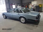 ✅ 1994 Jaguar XJ • VIN: SAJHX1740RC692884 • Lot: 66224115. Listed on Copart with 150,617 mi. Free auction sales archive from the USA and detailed vehicle history report at DreamBid. Image 2.