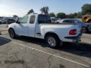 ✅ 1999 Ford F-150 • VIN: 1FTRX07WXXKC00489 • Lot: 64337605. Listed on Copart with Not provided. Free auction sales archive from the USA and detailed vehicle history report at DreamBid. Image 2.