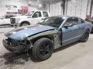 ✅ 2006 Ford Mustang GT Deluxe • VIN: 1ZVFT82H565117729 • Lot: 43598803. Listed on IAAI with 102,685 mi. Free auction sales archive from the USA and detailed vehicle history report at DreamBid. Image 2.