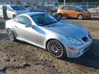 ✅ 2007 Mercedes-Benz SLK 55 AMG • VIN: WDBWK73F47F158263 • Лот: 43386124. Опубликован ранее на IAAI с пробегом 60 652 миль. Бесплатный доступ к архиву аукционных продаж из США и подробный отчёт об истории автомобиля на DreamBid. Изображение 1.