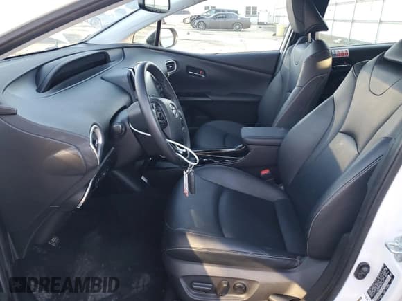 ✅ 2021 Toyota Prius XLE • VIN: JTDKAMFP4M3180069 • Lot: 85488195. Wystawiony na Copart z przebiegiem 99 326 mil. Bezpłatny archiwum sprzedaży aukcyjnych z USA i szczegółowy raport historii pojazdu na DreamBid. Zdjęcie 7.