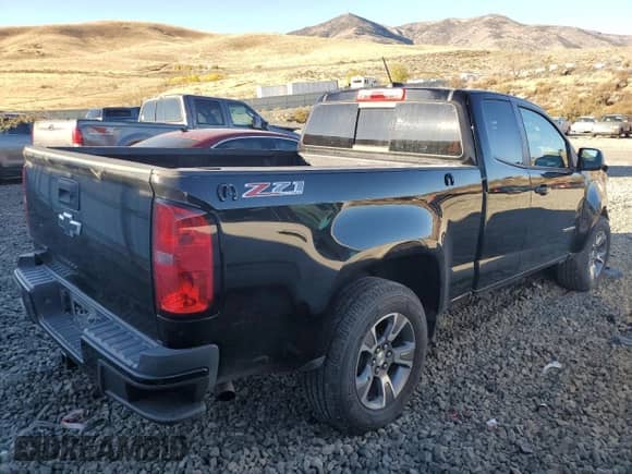 2018 Chevrolet Colorado 4WD Z71 with VIN 1GCHTDEN3J1169608, listed as a Copart auction lot 77887984 with 87,863 mi miles and Salvage title. Bid and sale history available at DreamBid. Image 3.