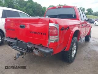 ✅ 2003 Dodge Dakota Sport • VIN: 1D7HG38X03S333959 • Lot: 42306578. Wystawiony na IAAI z przebiegiem 298 949 mil. Bezpłatny archiwum sprzedaży aukcyjnych z USA i szczegółowy raport historii pojazdu na DreamBid. Zdjęcie 6.