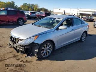 2012 Hyundai Sonata SE with VIN 5NPEC4AC5CH328230, listed as a Copart auction lot 82292555 with 210,741 mi miles and Salvage title. Bid and sale history available at DreamBid. Image 1.