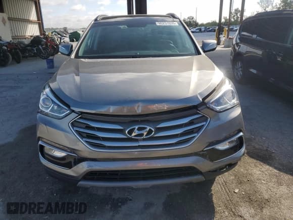 ✅ 2018 Hyundai Santa Fe 2.4L • VIN: 5XYZU3LB3JG556034 • Lot: 90231035. Listed on Copart with 26,542 mi. Free auction sales archive from the USA and detailed vehicle history report at DreamBid. Image 5.
