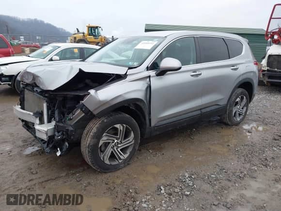 2022 Hyundai Santa Fe SE z VIN 5NMS1DAJ1NH400726, wystawiony jako IAAI lot #41680232 z przebiegiem 21 188 mil mil oraz . Historia ofert i sprzedaży dostępna na DreamBid. Obrazek 18.