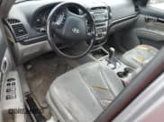 ✅ 2007 Hyundai Santa Fe SE • VIN: 5NMSH13E77H125053 • Lot: 77010114. Listed on Copart with Not provided. Free auction sales archive from the USA and detailed vehicle history report at DreamBid. Image 8.