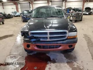 ✅ 2004 Dodge Dakota SLT • VIN: 1D7HG48N74S718148 • Lot: 77600084. Wystawiony na Copart z przebiegiem 242 858 mil. Bezpłatny archiwum sprzedaży aukcyjnych z USA i szczegółowy raport historii pojazdu na DreamBid. Zdjęcie 5.