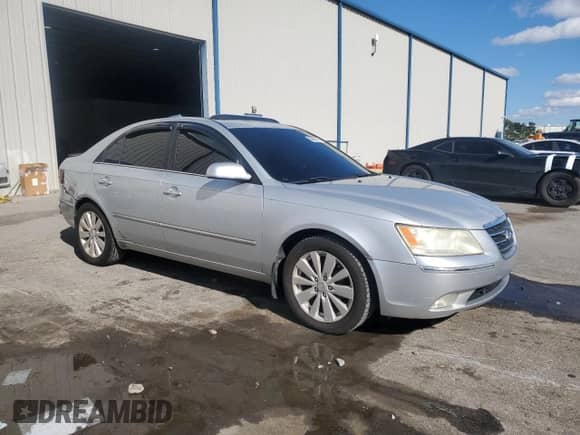 2009 Hyundai Sonata Limited with VIN 5NPEU46C59H458815, listed as a Copart auction lot 90906305 with 239,714 mi miles and Salvage title. Bid and sale history available at DreamBid. Image 4.