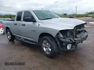 2018 Ram 1500 Tradesman z VIN 1C6RR6FG0JS280326, wystawiony jako IAAI lot #43422781 z przebiegiem 89 435 mil mil oraz . Historia ofert i sprzedaży dostępna na DreamBid. Obrazek 1.