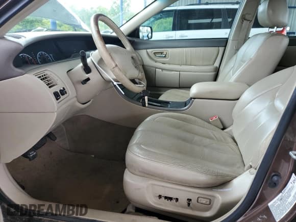 ✅ 2000 Toyota Avalon XL • VIN: 4T1BF28B3YU042591 • Лот: 68277995. Опубликован ранее на Copart с пробегом 312 652 миль. Бесплатный доступ к архиву аукционных продаж из США и подробный отчёт об истории автомобиля на DreamBid. Изображение 7.