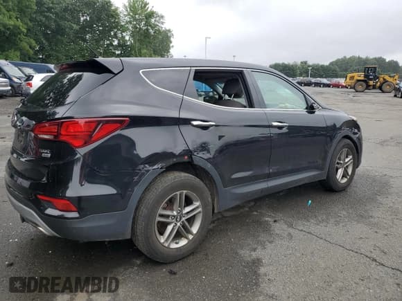 ✅ 2018 Hyundai Santa Fe 2.4L • VIN: 5XYZTDLB9JG569962 • Лот: 66455414. Опубликован ранее на Copart с пробегом 100 231 миль. Бесплатный доступ к архиву аукционных продаж из США и подробный отчёт об истории автомобиля на DreamBid. Изображение 3.