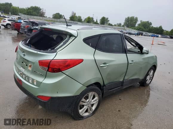 2013 Hyundai Tucson GLS z VIN KM8JU3AC4DU546815, wystawiony jako Copart lot #60543454 z przebiegiem 158 613 mil mil oraz Szkoda całkowita • Salvage title. Historia ofert i sprzedaży dostępna na DreamBid. Obrazek 3.