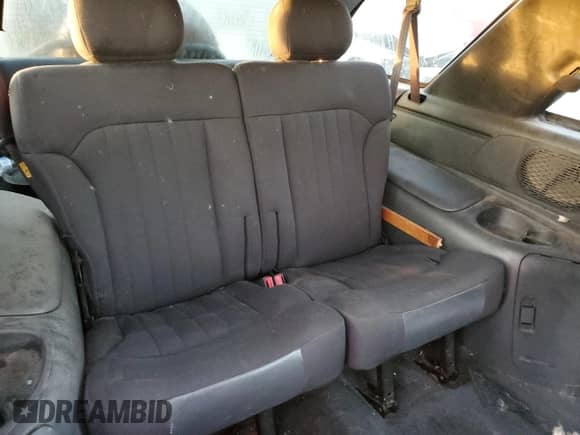 2004 Chevrolet Blazer LS z VIN 1GNCT18X64K158226, wystawiony jako Copart lot #75513394 z przebiegiem Nie podano mil oraz Czysty tytuł • Clean title. Historia ofert i sprzedaży dostępna na DreamBid. Obrazek 11.