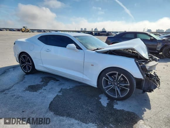 ✅ 2021 Chevrolet Camaro 1LT • VIN: 1G1FB1RS9M0137547 • Lot: 93377835. Listed on Copart with 72,714 mi. Free auction sales archive from the USA and detailed vehicle history report at DreamBid. Image 4.