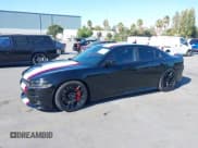 ✅ 2022 Dodge Charger Scat Pack • VIN: 2C3CDXGJ3NH199562 • Лот: 43246849. Опубликован ранее на IAAI с пробегом 19 390 миль. Бесплатный доступ к архиву аукционных продаж из США и подробный отчёт об истории автомобиля на DreamBid. Изображение 2.